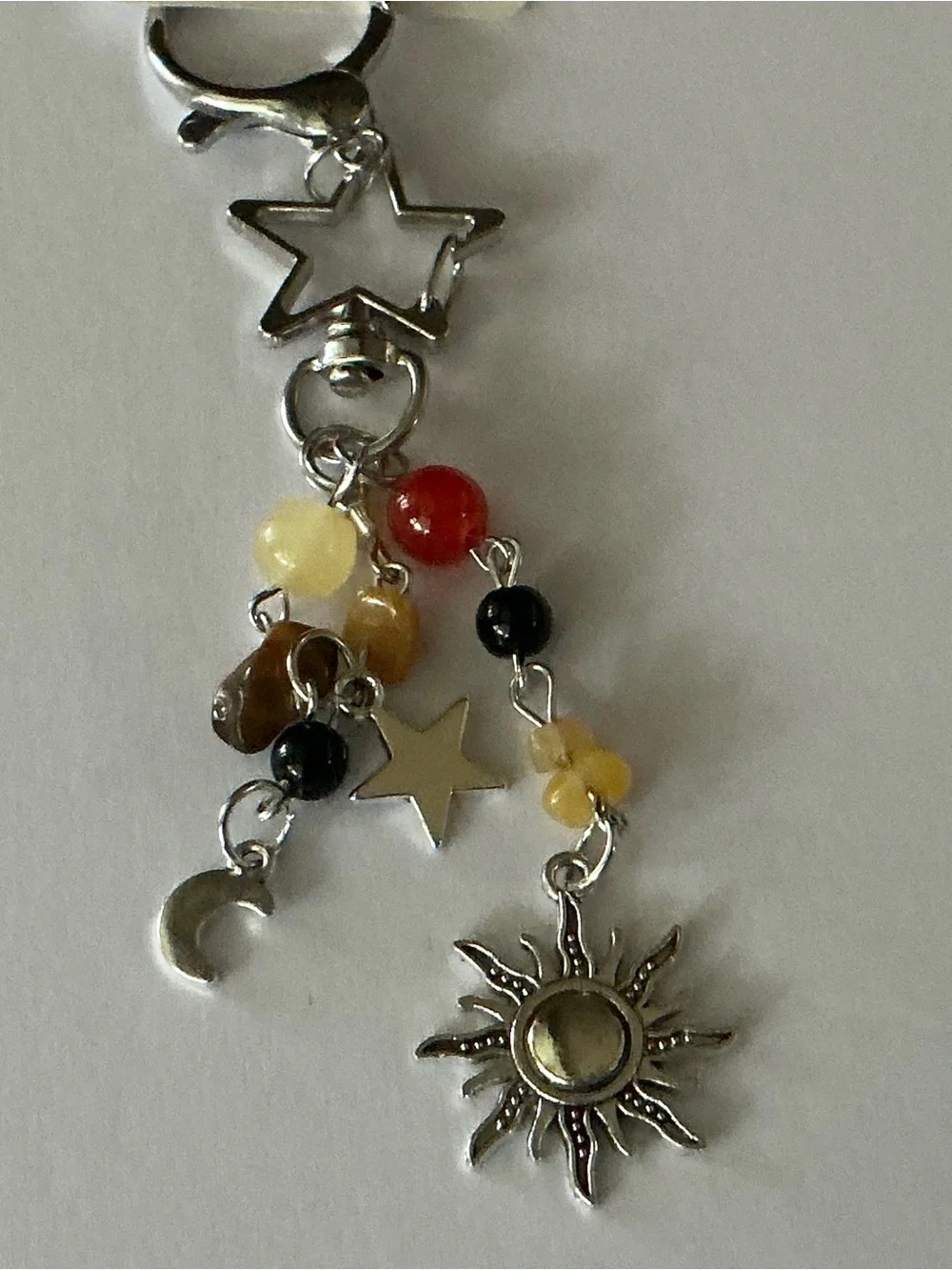 Sun & Star Dangle Charm Keychain - Silver with Red, Yellow, Black Beads